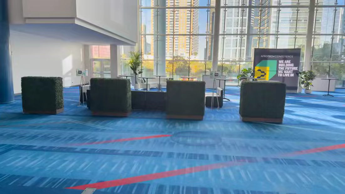 Modular artificial hedge installation at Afrotech 2024 in Houston